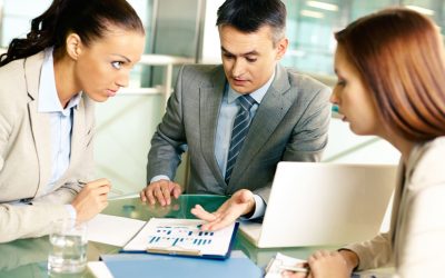 male-executive-explaining-graph-min